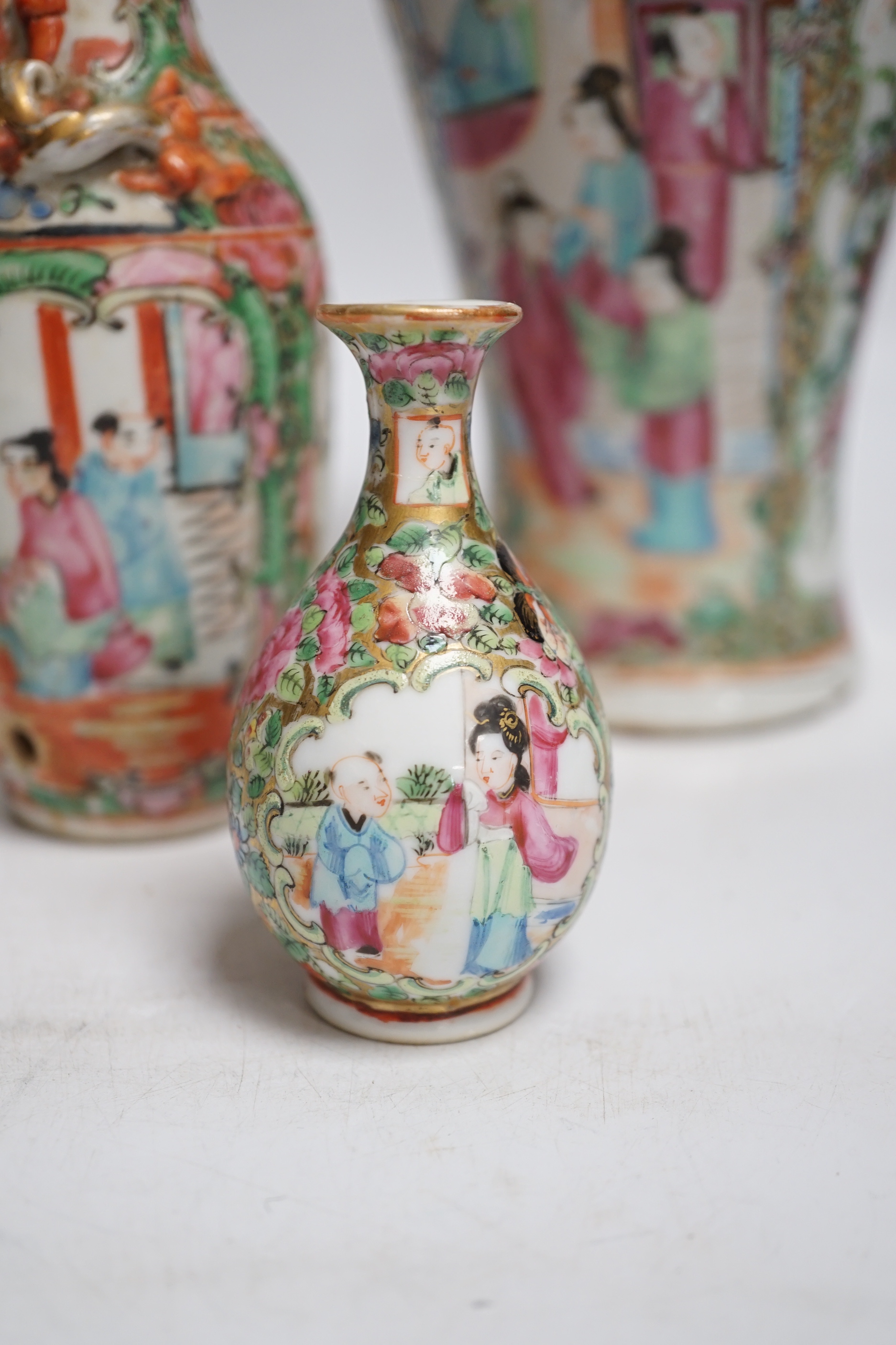 Four Chinese famille rose vases, a dragon cup and miniature blue and white vase (6), tallest 25.5cm high